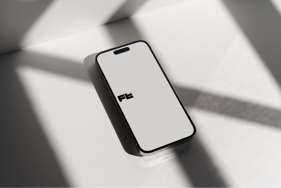 Flat lay of smartphone mockup with logo centered on cream background