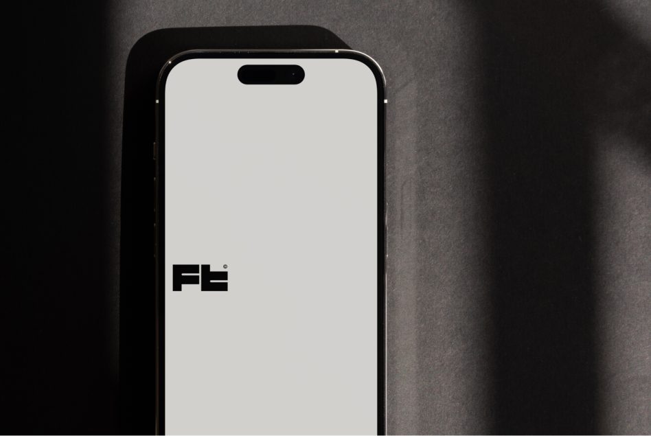 iPhone mockup front view with notch displaying logo on screen
