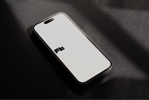 Dark smartphone mockup with white screen showing brand identity centered