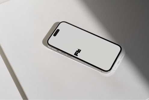 Horizontal phone mockup on white with dramatic shadow overlay