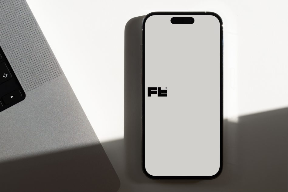 Smartphone displayed vertically with keyboard detail on neutral background
