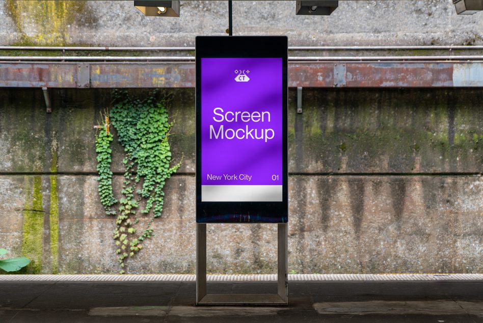 Vertical station screen glowing purple with white text on weathered concrete backdrop