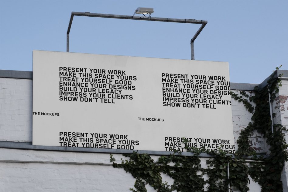 White billboard mockup on brick building facade with black text arranged in four quadrants