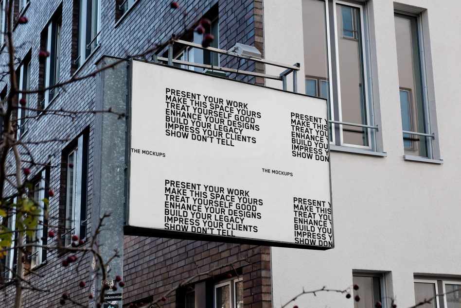 Exterior storefront sign mounted on building with black text on white background