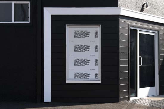 Exterior poster mockup on a modern black building, showcasing text design, ideal for presenting branding and advertising designs.
