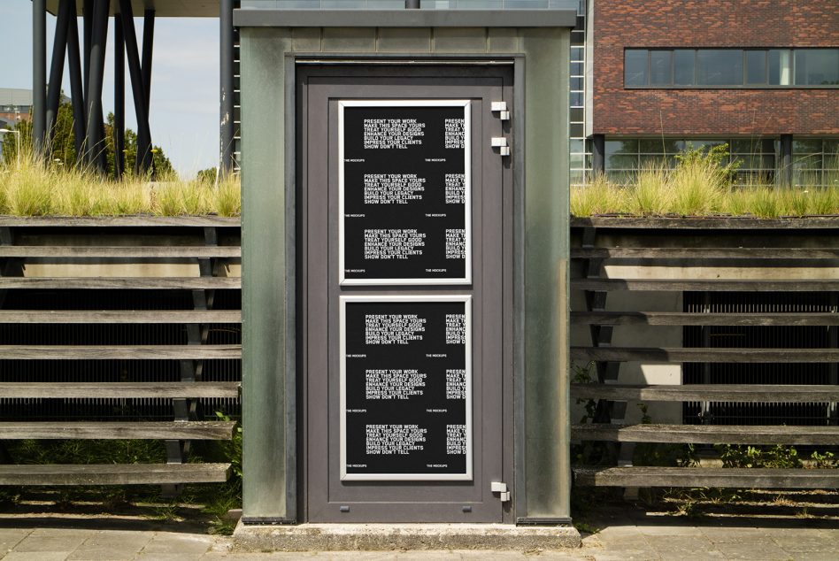Black poster stacked vertically in modern door frame between metal railings