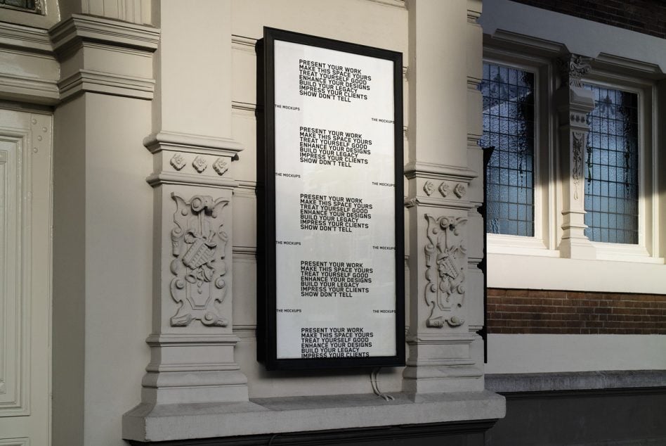 White vertical signage mockup on classical stone building facade with ornate details