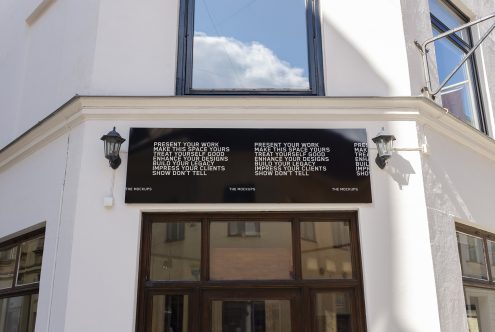 Exterior building mockup banners showcasing typography for designers to present work and impress clients, with clear sky backdrop.