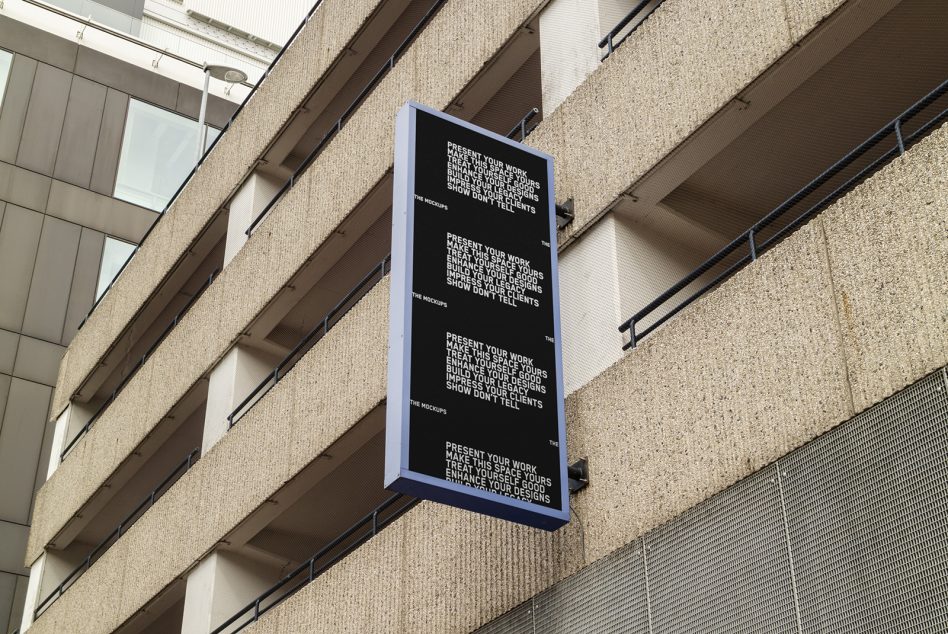 Vertical outdoor banner mockup hanging on a building exterior with text and QR codes, perfect for designers to showcase advertising designs.