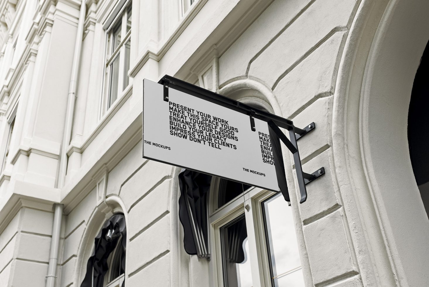 Elegant shop sign mockup on a classic building facade, ideal for presenting branding designs and logos in a realistic urban setting for designers.