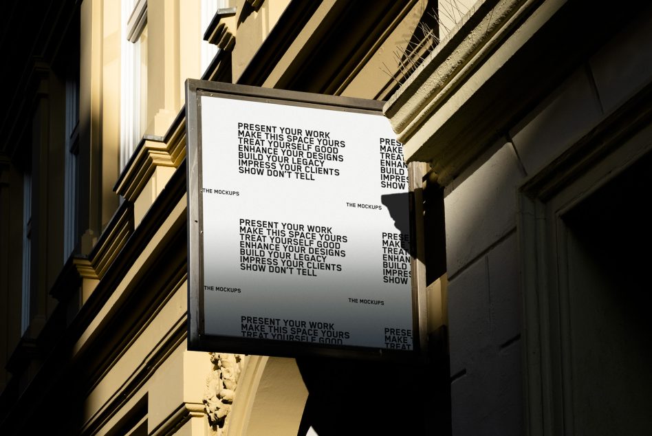 Illuminated street billboard mockup at dusk with text for presenting design work, set against a classic building facade. Ideal for design presentations.