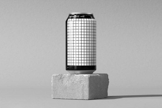 Minimalist beverage can mockup on stone plinth with grid design, perfect for product presentation and graphic design assets.