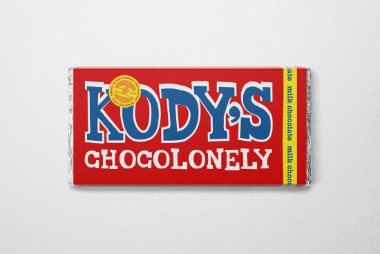Mockup of a chocolate bar with vibrant red and blue packaging, showcasing bold typography and a quality seal, on a plain background.