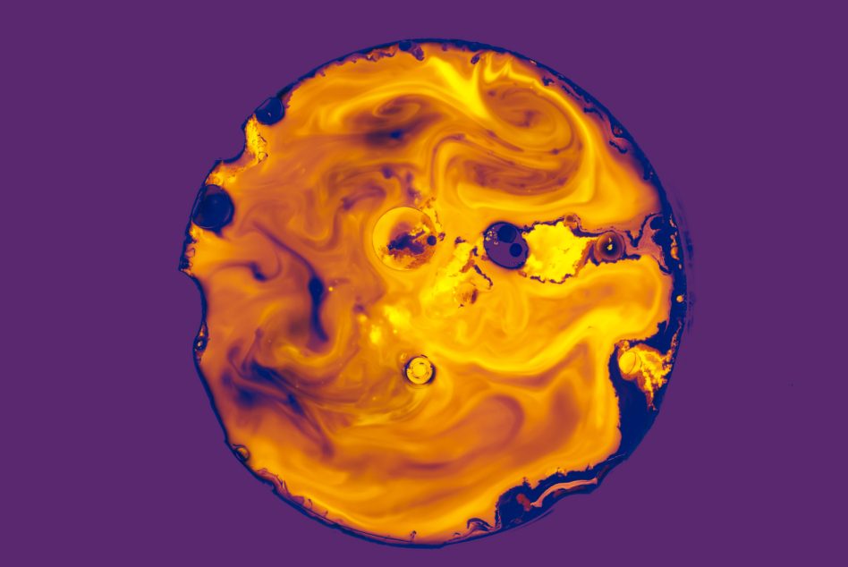 Swirling golden skull form with blue-purple accents on vibrant purple