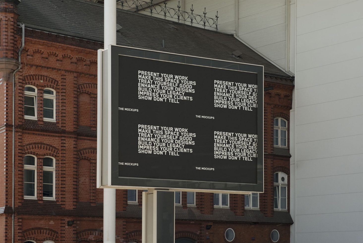 Outdoor billboard mockup on a building with inspirational design keywords, ideal for graphic presentation and advertising concepts.