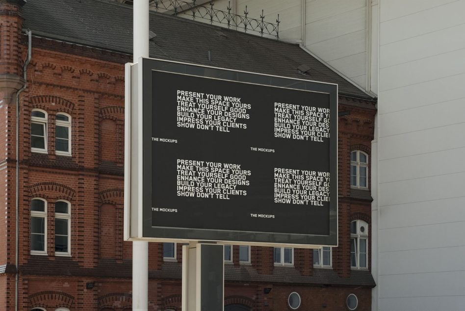 Large outdoor billboard with dark background displaying repeated text layout