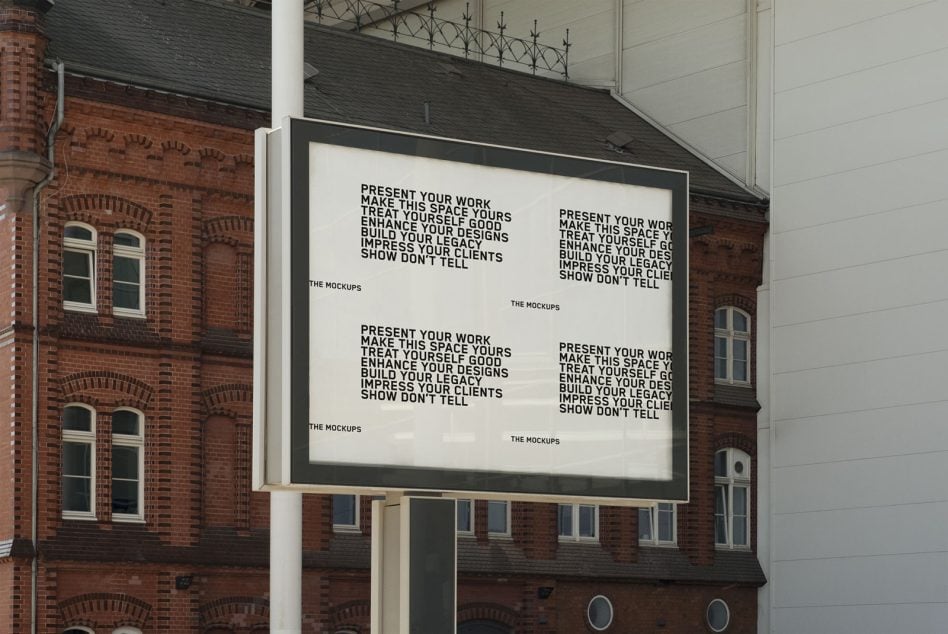 Large outdoor billboard with light background displaying repeated text layout