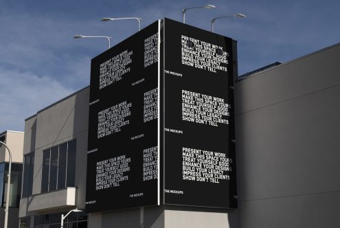 Billboard mockup on building exterior showcasing typographic design, ideal for presenting advertising work to clients and designers.