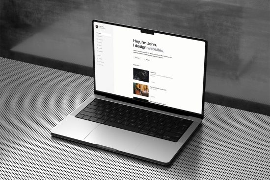 Laptop on desk with portfolio website design, realistic mockup for digital assets, template customization concept, modern style.