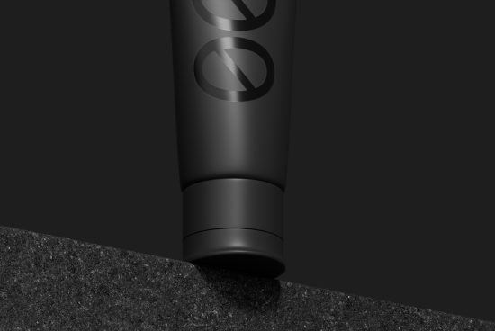 Black cosmetic tube packaging mockup on dark background, design presentation, branding, 3D rendering.