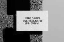 Business card mockup on concrete with neutral gray background