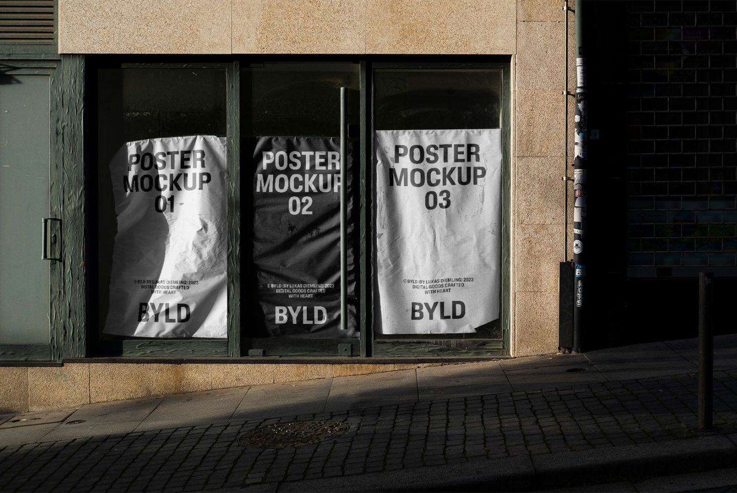 Urban poster mockup display in a street setting, perfect for graphic design presentations and storefront mockup visuals.