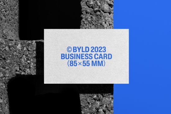 Business card mockup with textured background, standard size 85x55mm, creative presentation, modern design template, digital asset for designers.