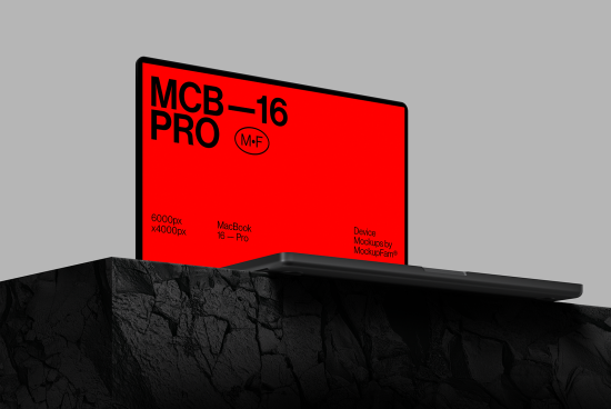 Laptop mockup with red screen on textured dark background, 6000x4000 resolution, ideal for showcasing designs and presentations.