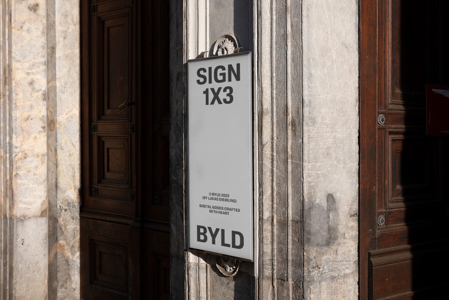 Vertical shop sign mockup hanging on a classic building wall, ideal for showcasing brand designs and logos in a realistic setting.