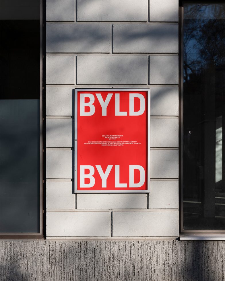 Bold red poster with 'BYLD' text on building wall mockup for designers, ideal for branding and advertising projects.