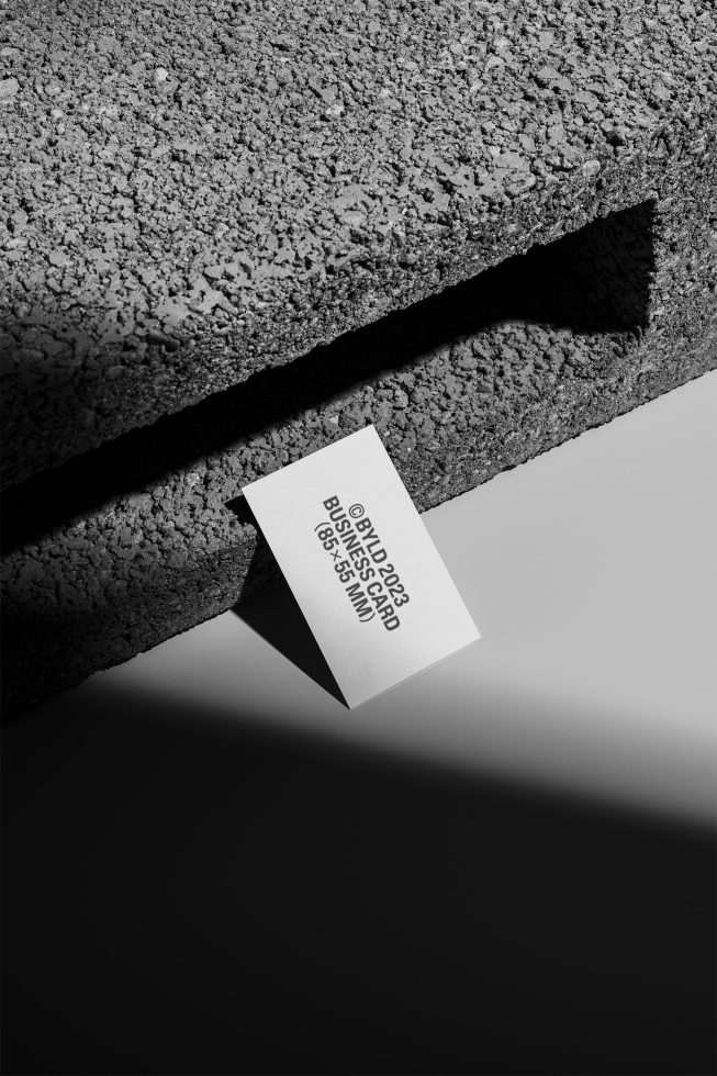 Creative business card mockup with natural shadows and textured surface for realistic presentation, ideal for modern design showcasing.