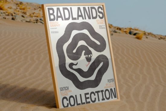 Desert mockup of a Badlands photo collection poster with a stylized snake design, standing in sand, clear for graphic and print designers.