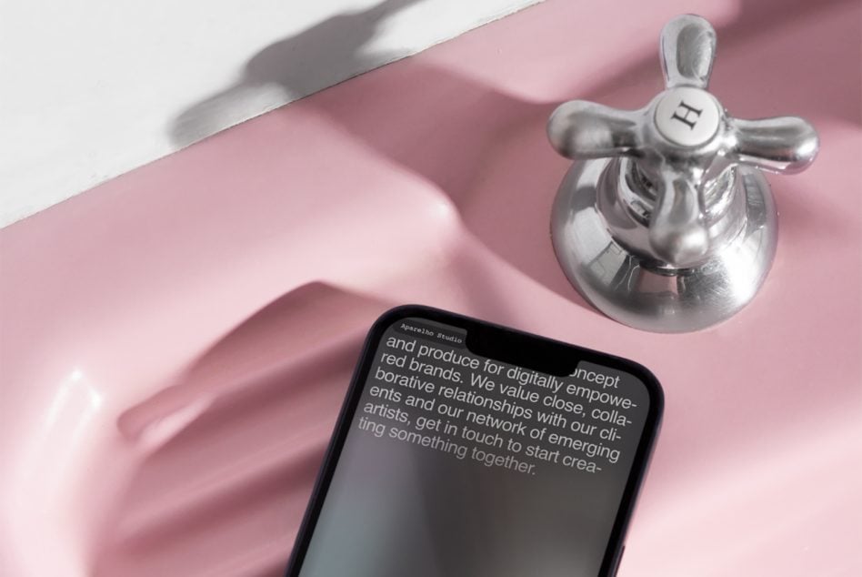 iPhone mockup on pink sink with text about Aprelho Studio branding services