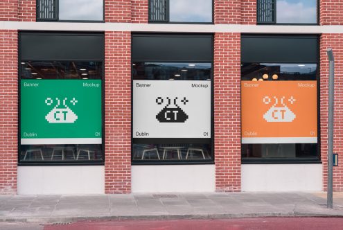 Three storefront window displays showing green, white, orange banner mockups