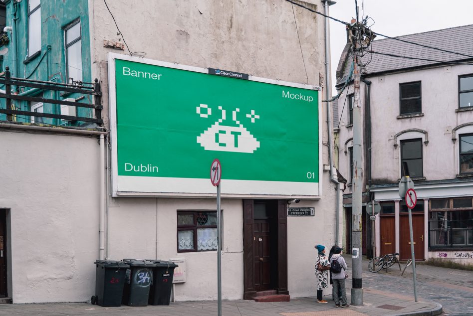 Green street billboard with white pixel logo, mounted on residential building