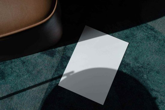Elegant paper mockup on a textured floor with natural shadows, ideal for realistic branding presentation, suitable for designers and creatives.