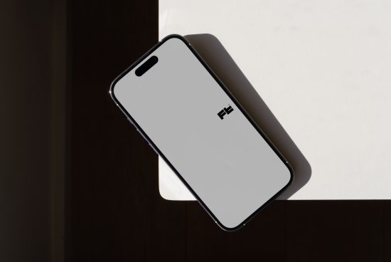 Smartphone mockup on white background with shadow, modern mobile design, digital asset for app presentation, suitable for designer portfolios.