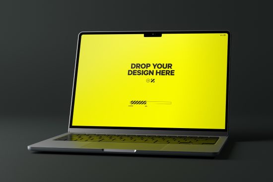 Laptop mockup on a dark background with a vivid yellow screen displaying 'Drop Your Design Here' message, ideal for digital product showcase.