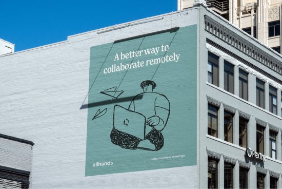 Billboard mockup on building exterior showcasing remote collaboration advertisement with illustrated figure using laptop. Graphics category, design asset.