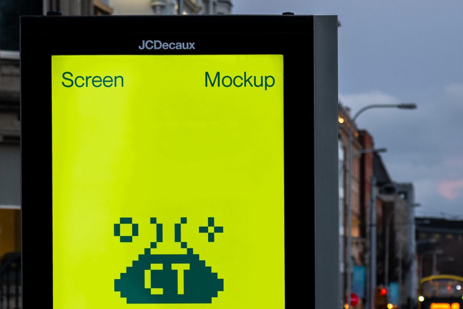 JCDecaux bright yellow billboard with retro pixel art UFO design