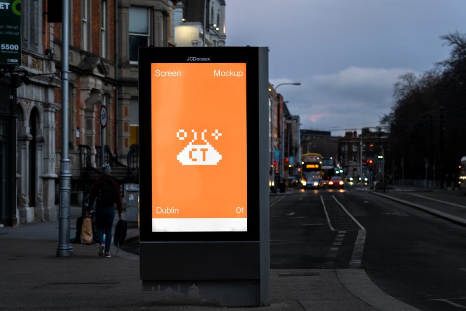 Orange street display JCDecaux showing white pixelated alien spacecraft