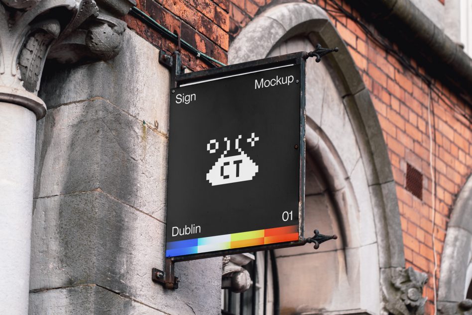 Black hanging sign on brick building with pixel art cloud logo