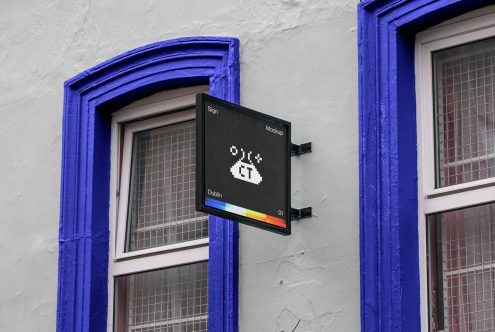 Bracket sign on blue door frame with color bar test pattern mockup