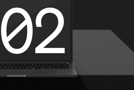 Laptop mockup with stylized number 2 on screen, ideal for presenting digital font design or user interface layout.