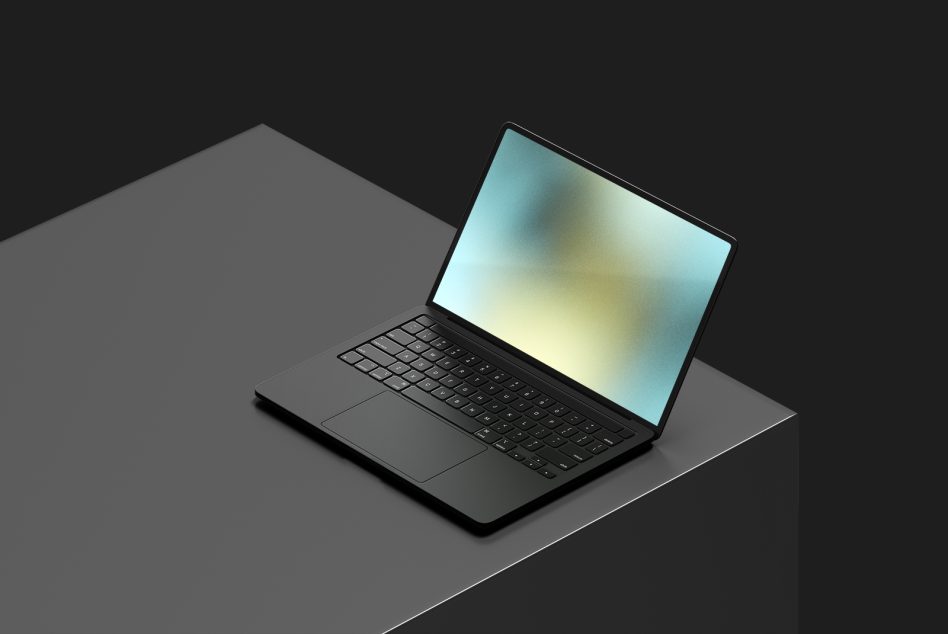 Sleek modern laptop on dark surface, high-resolution professional mockup, editable digital asset for designers, ideal for presentations and web design.