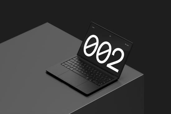 Laptop mockup on dark surface with stylized number display, minimalist design, sleek modern look, ideal for presentations and portfolios.