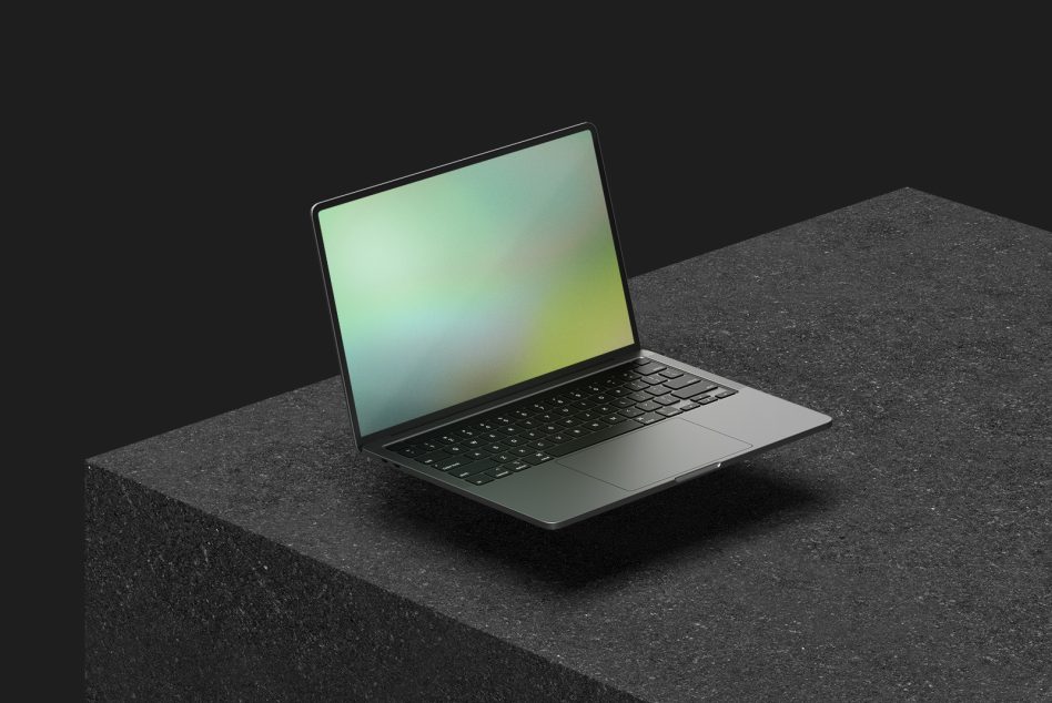 Minimalist laptop mockup on textured surface for digital design presentation, showcasing modern device in sleek, professional layout.