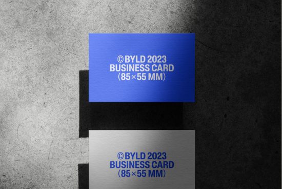Blue and white textured business card mockup on a concrete background, ideal for designers, realistic shadow overlay, 85x55 mm.