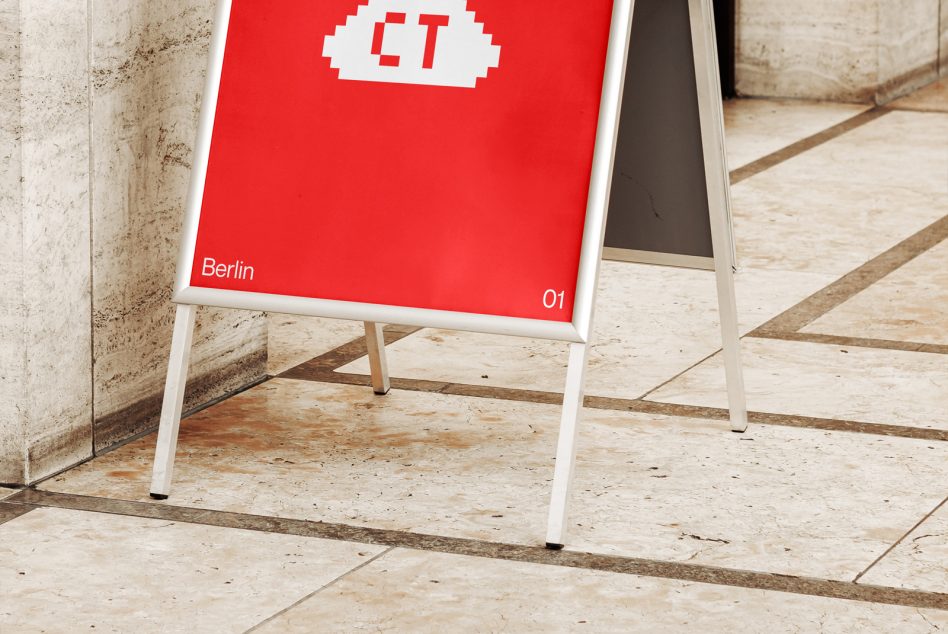 White A-Frame stand with red panel showing pixelated ET graphic
