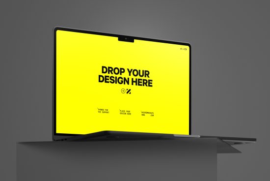 Laptop mockup with vibrant yellow screen showing place your design text for digital asset presentations, ideal for designers.